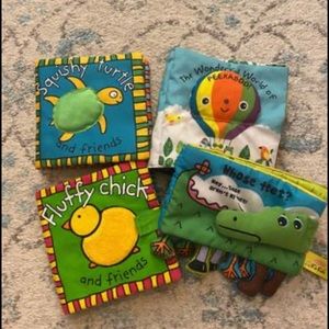 Set of 4 cloth books.